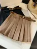Falda plisada de gamuza para mujer, nuevo diseño de otoño, falda versátil de línea A de cintura alta que disimula las caderas y crea un efecto adelgazante, falda corta vintage