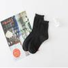 Otoño 2021 Nuevos Calcetines de Mujer de Color Sólido Blanco y Negro con Trenza Dulces Calcetines JK Moda Femenina Estudiante Moda Calcetines Personalizados