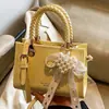 Outono de 2026 Novo Estilo Coreano Nicho Alto Valor Moderno Simples para o Dia a Dia Bolsa Pequena Feminina Transversal Quadrada Pequena