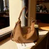 Bolsa de Gran Capacidad para Mujer 2025 Invierno Nuevo Estilo Maillard Retro Bolsa de Viaje Bolso Cruzado de Nicho Mochila