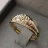Huajie deseja o best-seller novo anel de padrão vazado moda simples Coringa banhado a ouro 18K anel feminino fabricantes de joias
