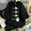 Seda de leche verano nuevo estilo con estampado de texto divertido, tendencia de verano nicho, top versátil de uso diario de corte holgado sin hombros
