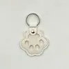Novo pingente memorial criativo para guardar pelos de pet, porta-cartão de acesso à porta anti-perda, pingente de chaveiro de pata de cachorro