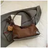 Bolsas Retrô de Nicho Transfronteiriças para Mulheres Moda Nova Outono e Inverno 2025 Bolsa Transversal Versátil Bolsa de Ombro Simples para o Dia a Dia