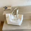 Bolsa feminina grande vintage, nova bolsa de ombro versátil outono e inverno 2026, popular este ano, bolsa tote simples para o dia a dia
