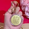 Año de la Oveja Sobre Rojo Saludos de Año Nuevo Souvenir Banco Seguro Regalo Llavero de Lámina de Oro Imitación Llavero Colgante