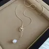 Collar redondo de perlas con cuentas estilo francés, sensación de lujo ligero y alta gama, cadena de suéter de doble capa, accesorio de nicho de diseño único para mujer
