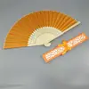 Comercio electrónico transfronterizo abanico femenino elegante más vendido 21cm abanico de boda abanico femenino caja hueca 14 colores opcionales