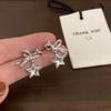 Otoño e invierno Nuevos pendientes de estrella con lazo y circonita diseño de nicho femenino lujo ligero elegantes exquisitos pendientes femeninos