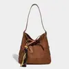 Bolso Trenzado de Nicho Súper Popular 2025 Nuevo Versátil para el Trabajo Hombro Cruzado Bolso Cubo de Moda de Gama Alta