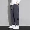 Pantalones de chándal pesados para hombre, primavera y otoño 2025, nuevos y modernos, holgados, casuales, con retazos, engrosados, deportivos, tipo jogger