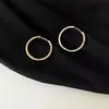 Aros de oreja retro de temperamento europeo y americano, aros lisos, estilo popular, pendientes de aro con temperamento, pendientes simples de lujo ligero, nicho, sentido de alta gama, para mujer