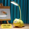 Lámpara de escritorio mini de dibujos animados lámpara de escritorio protección ocular infantil doble uso con portalápices carga USB resistencia plegable lámpara de noche al por mayor