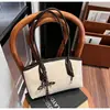 Bolsa para Comutador Transfronteiriço Feminina 2025 Nova Popular Moda Versátil Bolsa de Ombro Textura Casual Versátil Bolsa Tote