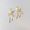 Pendientes de lazo dulces y frescos, pendientes de cobre simples y lisos de moda, pendientes de metal con paisaje de Hong Kong, joyería al por mayor 2025