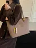 Bolso de mano retro transfronterizo estilo coreano para mujer, gran capacidad, nueva colección de verano 2026, bandolera versátil y simple, bolso de mano para el trabajo
