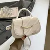 Bolsa Texturizada de Venta Caliente Estilo Coreano Otoño 2026 Nuevo Bolso de Hombro de Moda Versátil Simple Elegante Bolso Cruzado