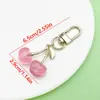 Artículo Popular de Comercio Exterior de Amazon: Llavero de Resina de Color Sólido con Goteo de Aceite Perla Cereza Accesorio de Llavero de Metal Colgante Pequeño