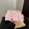 Bolsa de noite feminina transfronteiriça, bolsa concha com fecho floral, nova bolsa de mão outono 2026, bolsa de ombro com corrente, bolsa de axila