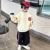 Conjunto de Ropa de Primavera para Niños 2026 Nuevo Estilo Celebridad de Internet Guapo Ropa para Niños Pequeños y Medianos Sudadera Deportiva de Primavera y Otoño Conjunto de Dos Piezas