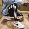 Conjunto de Casal Novo da Primavera e Outono 2023 Transfronteiriço Três Listras Moda Coreana Casual Esportivo Slim Conjunto de Duas Peças para Homens