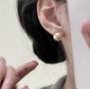 Pendientes de perlas con diseño de lujo y luz de aguja plateada, estilo coreano, elegantes, nuevos y con explosiones, de nicho.