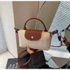 Mini Bolso Tejido de Verano para Mujer 2026 Nuevo Estilo Bolso de Hombro Único Cruzado Bolso Pequeño para Vacaciones en la Playa Bolso Cubo