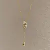 Colar da moda de luxo leve estilo comércio exterior com design de olho, borla de diamante, pingente de gota d'água para mulheres, corrente longa em Y para a clavícula