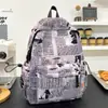 Versión Coreana Ins Nuevo Mochila de Alto Valor Personalizada con Graffiti Tendencia Fresca Mochila de Color Bloqueo para Parejas Simple de Gran Capacidad