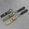 Mosquetón portátil para botellas de agua, clip de liberación rápida para botella de agua mineral, colgador táctico de cincha para botella de agua para exteriores, práctico y portátil