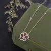 Collar de flor de dinero de la suerte de plata pura 999 para mujer, colgante de flor de ágata roja y diamante versátil de nicho, cadena para clavícula nueva 2026