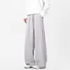 Pantalones finos de seda helada para hombre de verano 2025, pantalones casuales rectos holgados con caída, pantalones de vestir grises