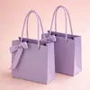 Ventas Directas de Fábrica Bolsas de Tote de Papel Kraft Grueso Bolsas de Compras para Ropa Regalo Bolsas de Papel de Empaque Rosa Al por Mayor