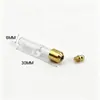 Venta al por mayor del fabricante 6 mm Alambre Dorado Trenzado Tapa Tallado de Arroz Botella de los Deseos Abrelatas Transparente Cinabrio Colgante de Botella Pequeña de Vidrio