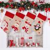 Decoraciones navideñas nuevas transfronterizas borde rojo lino de imitación estampado de dibujos animados calcetines navideños calcetines de regalo para niños colgante para árbol