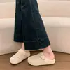 Mules de cuero suave con suela gruesa para aumentar la altura, puntera cerrada para mujer, nuevo modelo de verano 2026, calzado para exteriores, sandalias de malla tejida caladas