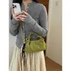 Exquisito bolso retro de gamuza de nicho para mujer, nuevo modelo 2026, bolso cruzado casual versátil, bolso de mano pequeño súper popular