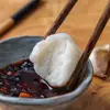 Los mayoristas usan bolitas de calamar, bolitas de cubo de tinta, bolitas de flor, ingredientes para olla caliente, brochetas picantes calientes, ingredientes hervidos de Cantón, congelados rápidos