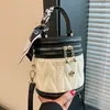 Bolso de mujer bordado de nicho texturizado transfronterizo, nuevo bolso cruzado versátil otoño 2026, bolso de mano de moda, bolso tipo cubo