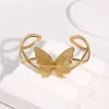 Pulsera Abierta de Acero Inoxidable de Venta Caliente Europea y Americana, Nicho Elegante de Gama Alta con Diseño de Mariposa, Pulsera de Acero de Titanio Dorado de 18K para Mujer