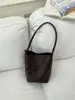Bolso de cubo tejido con patrón retro transfronterizo para mujer, nuevo bolso de mano de moda 2026, bolso casual de hombro y axila para mujer