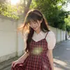 Vestido de tirantes a cuadros con mangas abullonadas, diseño falso de dos piezas, para mujer, diseño de nicho de verano, vestido elegante de alta gama para estudiante