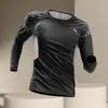 Venta al por mayor del fabricante Ropa de fitness de secado rápido para primavera y otoño Camiseta de manga larga con cuello redondo ajustada para hombre Top de entrenamiento
