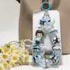 Popular Série Genuína Pop Mart Casquinha de Sorvete Contas Perfuradas de Óleo Pesado Pintadas à Mão Corrente de Celular Anti-Perda Celebridade da Internet Atacado
