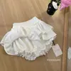 Verano 2025 Nueva Falda Corta Abullonada Estilo Pastel Anti-Exposición de Cintura Alta para Mujeres Petites Blanca
