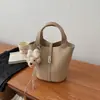 Bolsa de balde casual de nicho estilo coreano para comércio exterior, feminina, 2026, nova, simples para o dia a dia, de ombro único, transversal