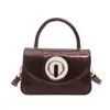 Bolso pequeño cuadrado de lujo de alta gama 2026, bolso de mano versátil y elegante para mujer, adecuado para ir al trabajo, bolsos cruzados de moda para mujer