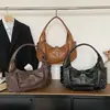 Bolso tote de gran capacidad a la moda tipo 'dumpling' para mujer, nuevo modelo primavera 2026, alta calidad, lujo ligero, bolso de hombro y axila de nicho
