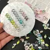Wuzhou K9 súper brillantes 6x10 diamantes de imitación con forma de huevo de paloma 1:1 réplica de accesorios de uñas decorativas Huazi de fondo puntiagudo DIY