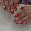 Manicura Transfronteriza Más Vendida 24 Piezas Europeas y Americanas Chica Caliente Rojo Francés Lazo Brillo Diamante Longitud Media Uñas Portátiles Venta al por Mayor